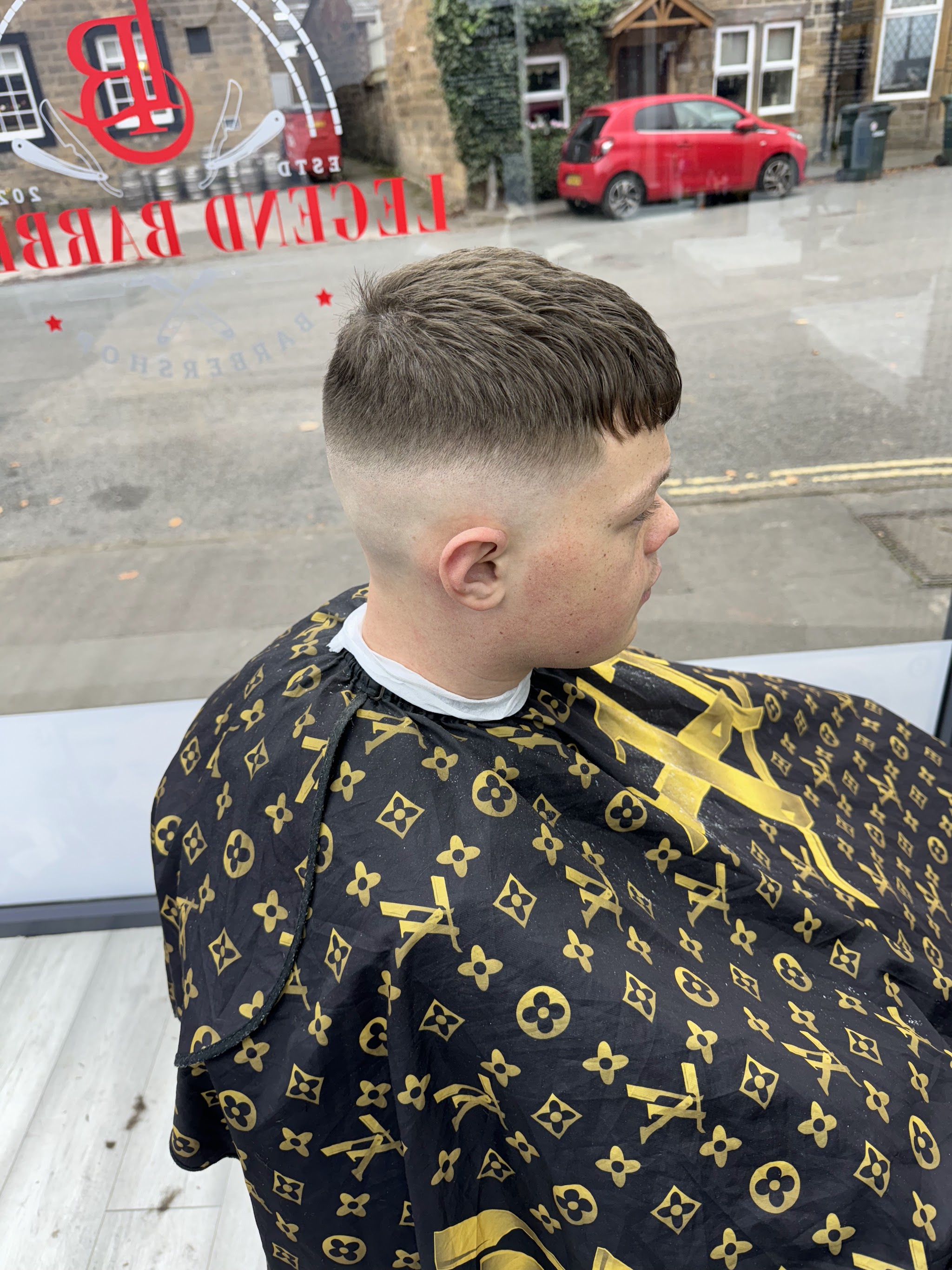 A finished dark-haired skin fade at Legend Barbers